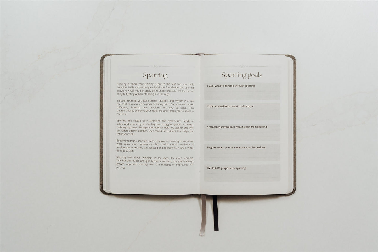 The MMA Journal lying open on a white background