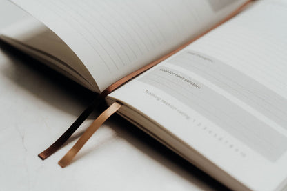 The Karate Journal open showing its two ribbon markers