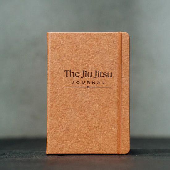 A video showing a flick through of the pages from front to back of a brown leather note book