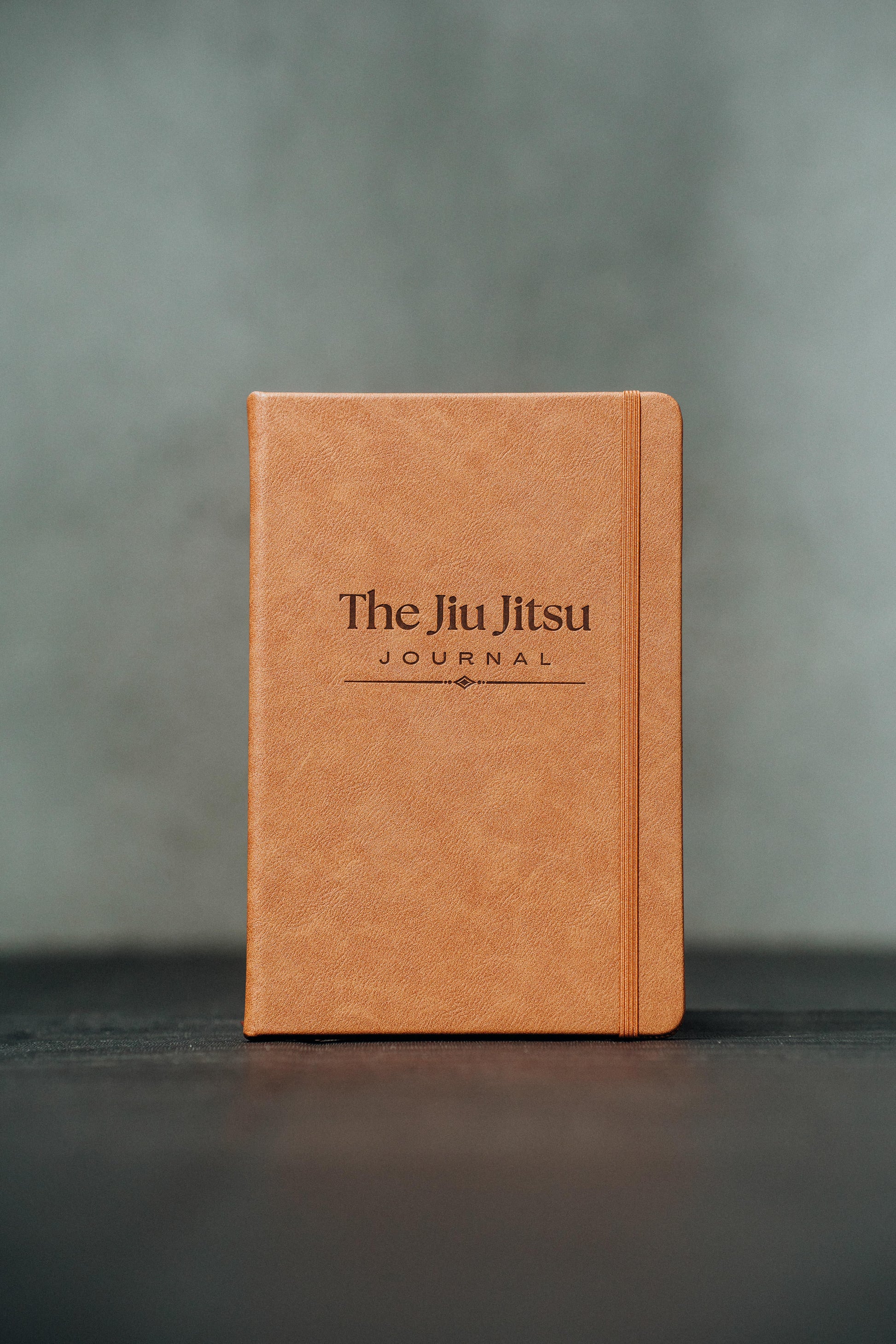 A video showing a flick through of the pages from front to back of a brown leather note book